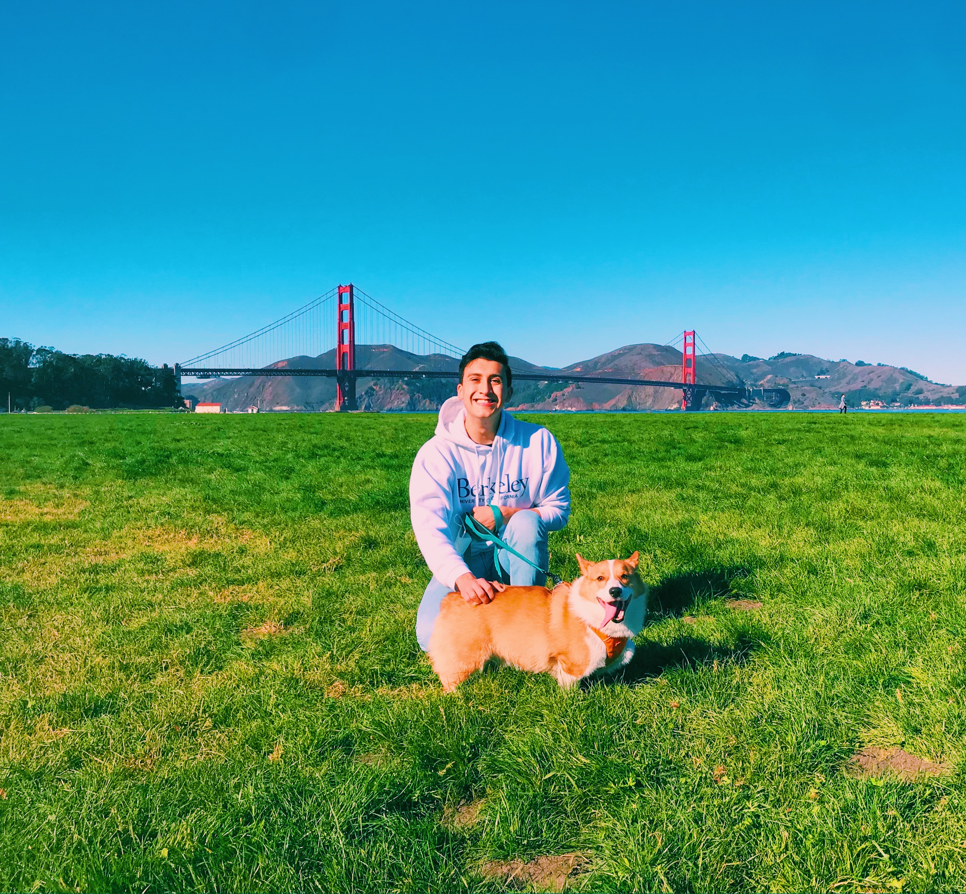 Me with my dog in front of the Golden Gate Bridge